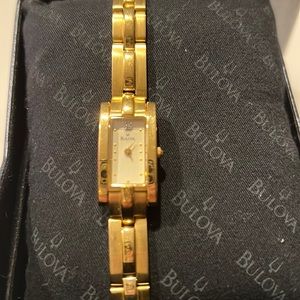 BULOVA women’s gold toned bracelet watch